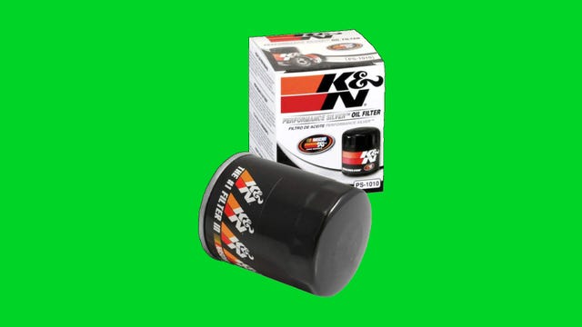 K&N Performance Silver engine oil filter on a green background