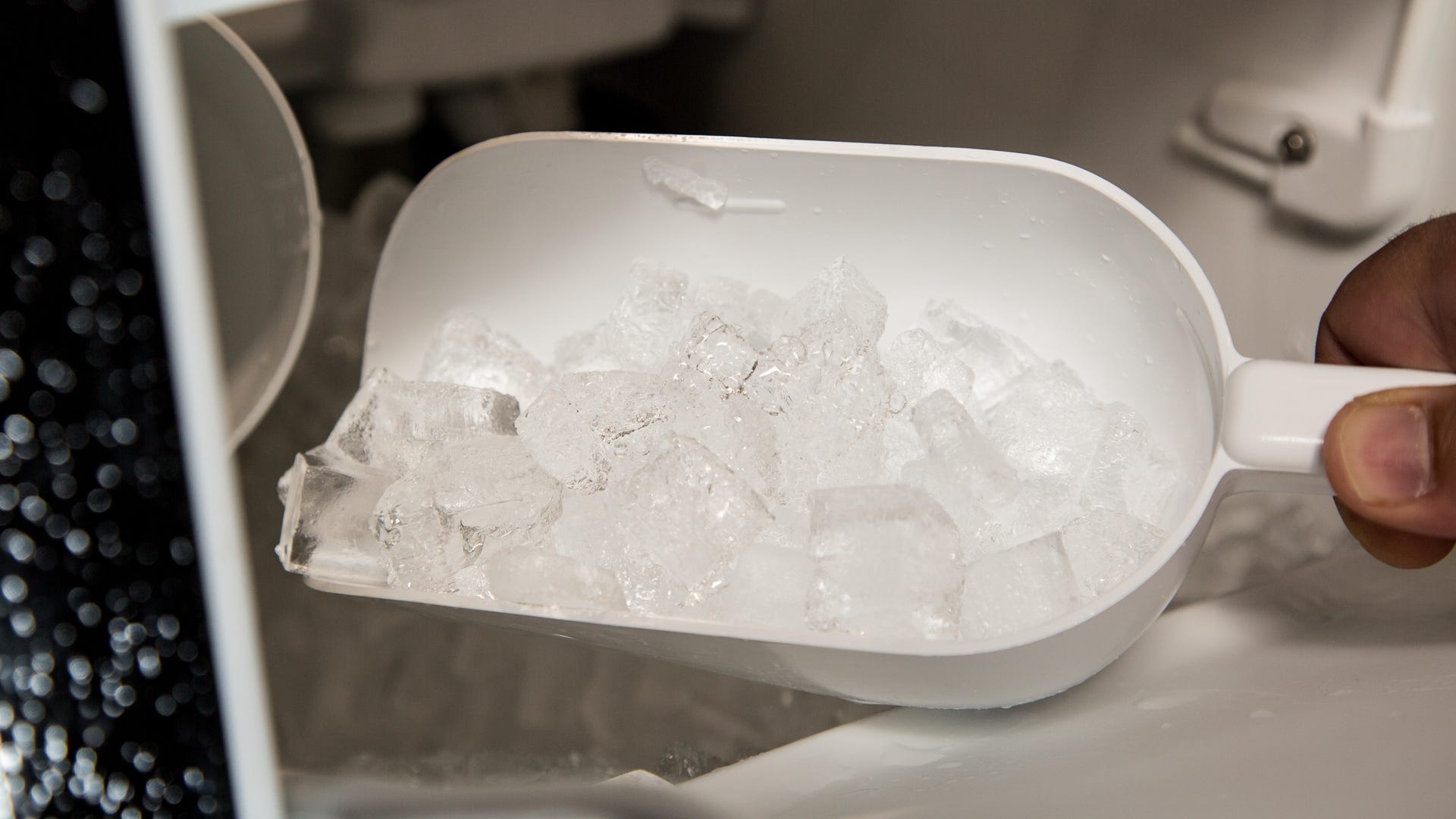 Unsanitary ice scoop can contaminate ice in the bin!
