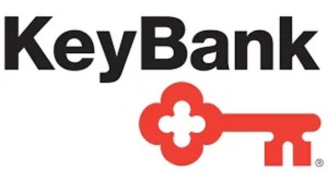 Logo Keybank.  Fond blanc avec des lettres noires et un bouton rouge