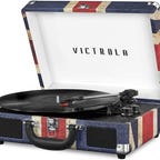 A vinyl record player in a union jack covered suitcase
