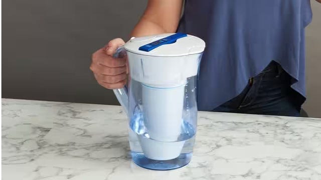 zero water pitcher being held on counter