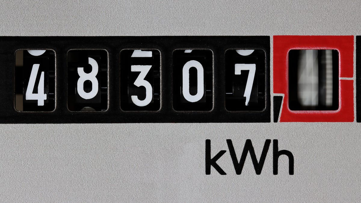 An electricity meter showing kilowatt-hours increasing quickly.