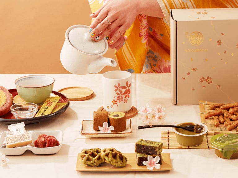 japanese sweet snacks and tea arranged on table
