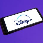 Disney+ logo on a phone