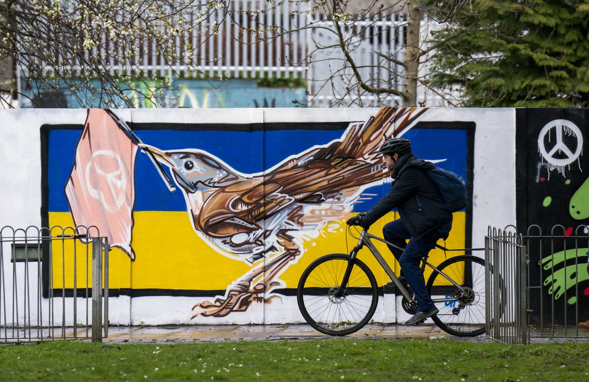 A mural seen in the Leith district of Edinburgh, Scotland, on April 5 features a nightingale, the official national bird of Ukraine, against the country's flag.