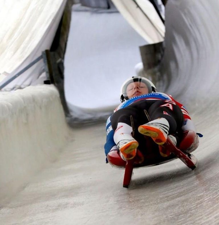 Luger zips down the track on a sled built directly from prototypes that Stratasys designed and 3D printed.