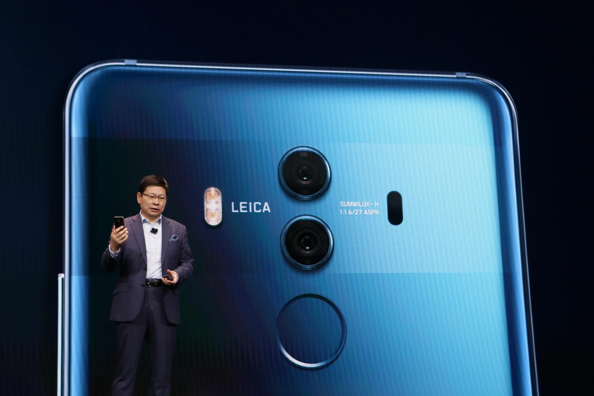 Richard Yu, CEO of Huawei's consumer business group, touts the Mate 10 Pro Porsche Edition at CES.