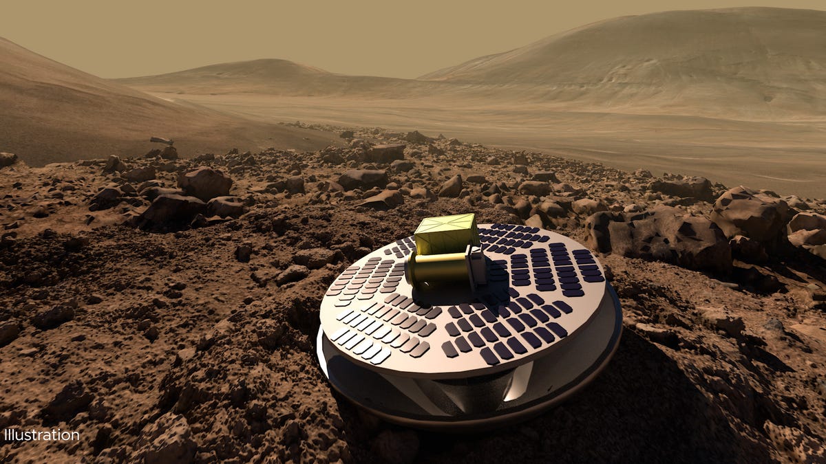 A silvery round Mars lander prototype appears in an illustration on a rocky patch of the red planet.