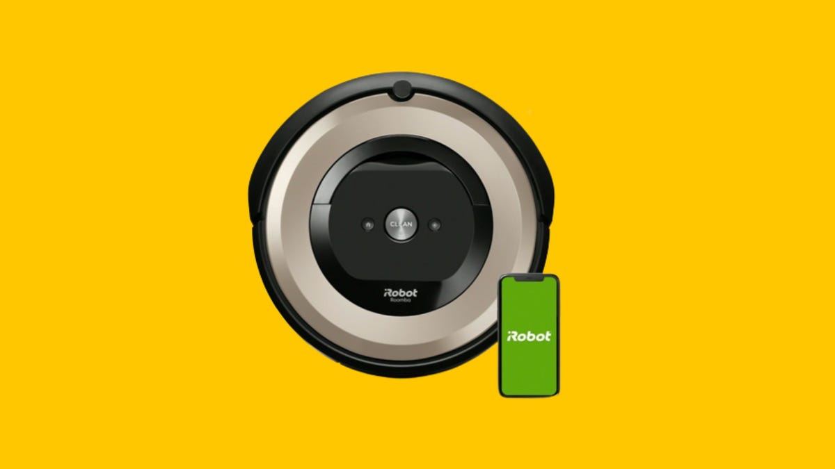 A Roomba E6 robot vacuum and smartphone against a yellow background.