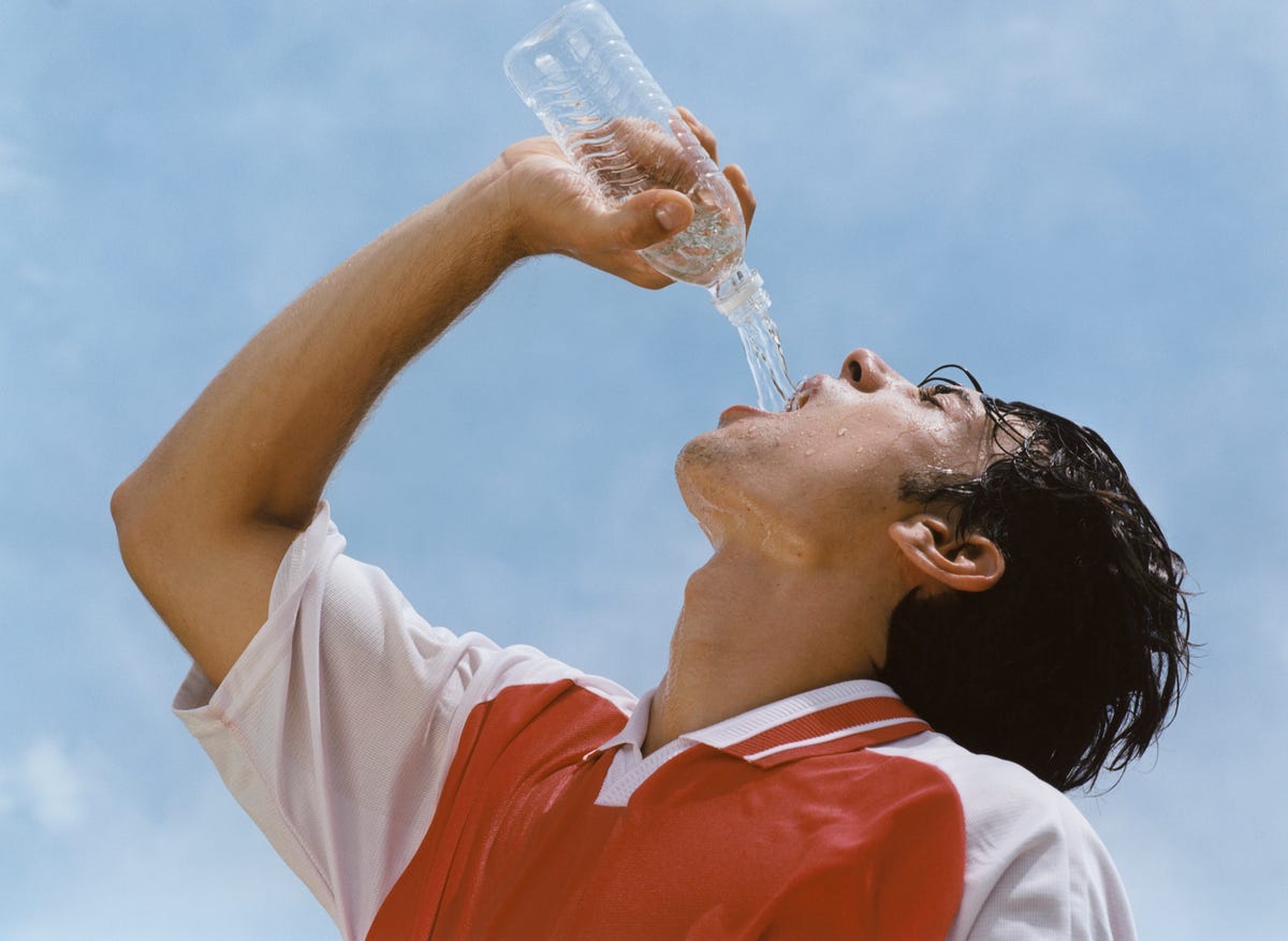 Soccer player drinking water