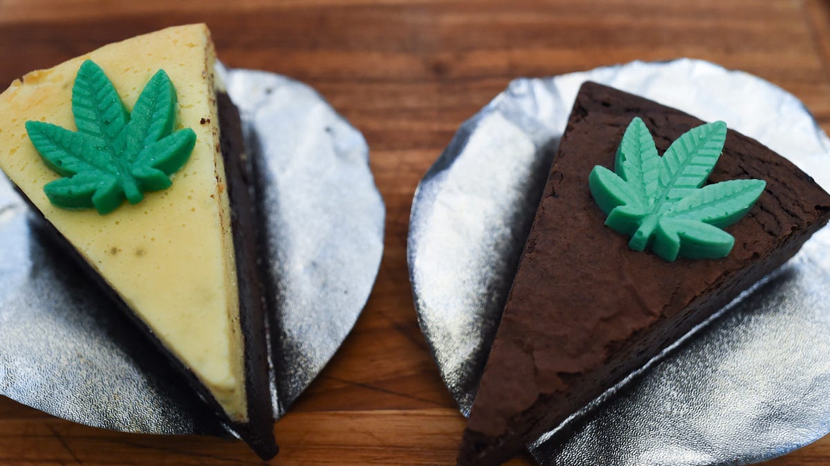 Slices of cakes with cannabis-leaf decorations.