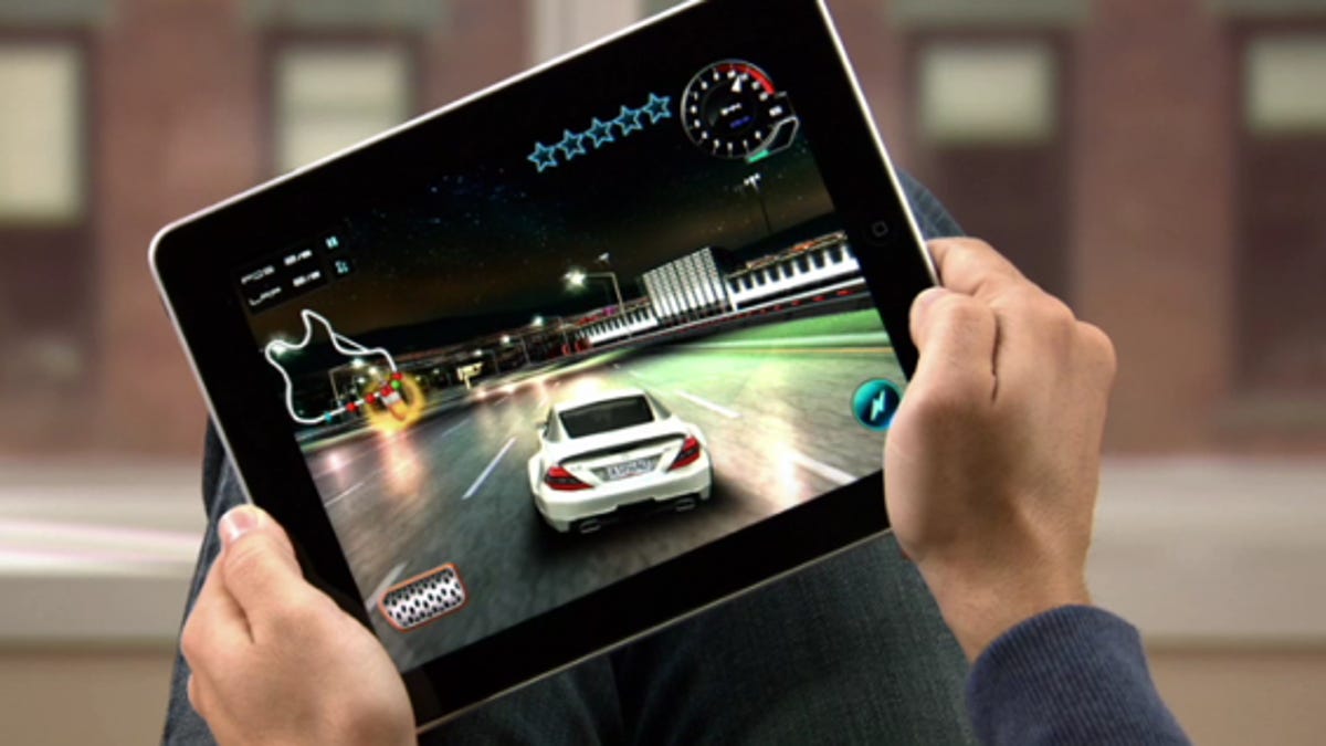 Playing Gameloft's Asphalt 5 on an iPad.
