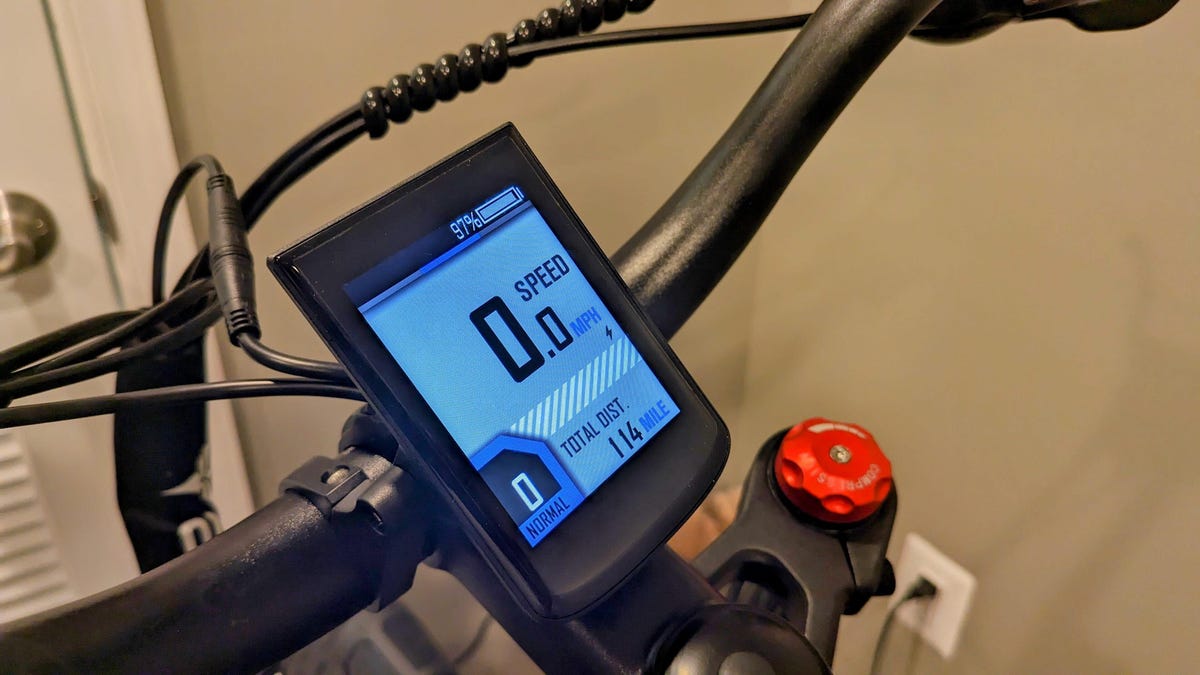 A small blue screen on the handlebars