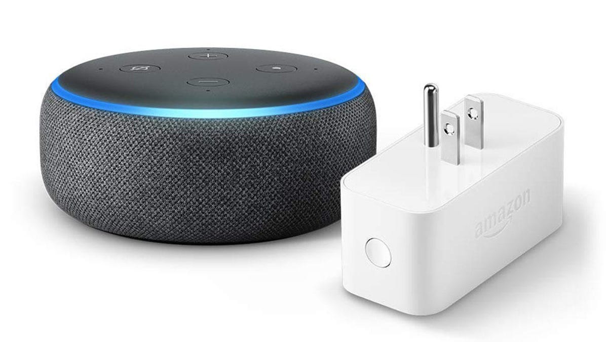 A third-gen Echo Dot smart speaker and a white Amazon smart plug against a white background.