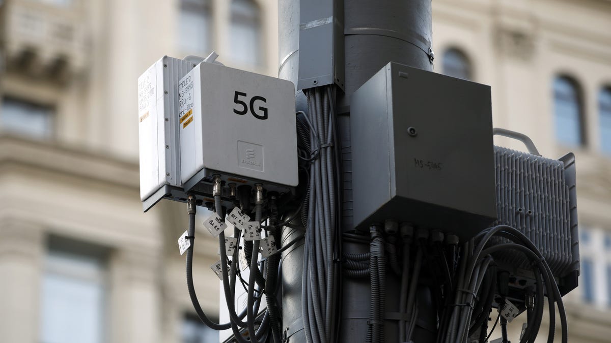 5G signal box on a pole on a city street