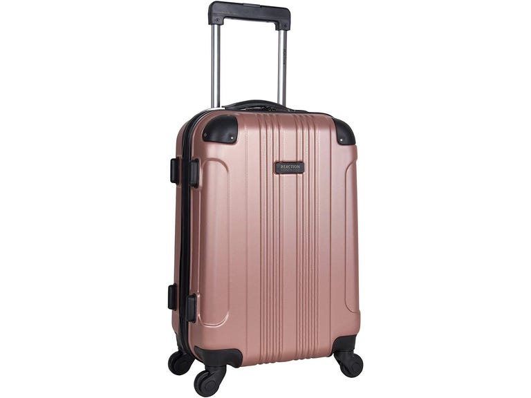 Pink Kenneth Cole Reaction hard shell suitcase