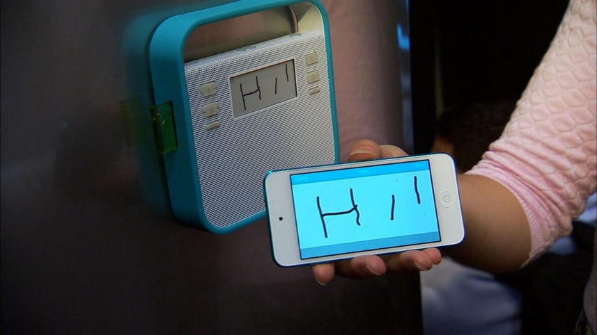 Triby puts the phone on your fridge