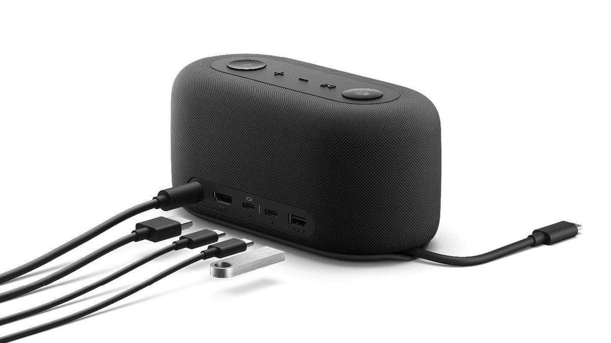Microsoft Audio Dock with cords running to the ports on back to demonstrate its USB-C, USB-A and HDMI ports.