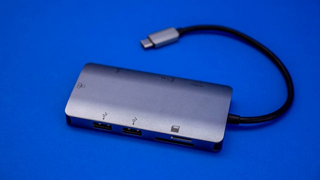 EZQuest USB-C Multimedia Hub on a blue background.