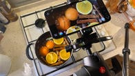 Picture of the iPhone 12 Pro Max filming a pan of mulled cider ingredients