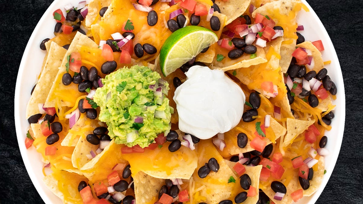 A plate of nachos, seen from above