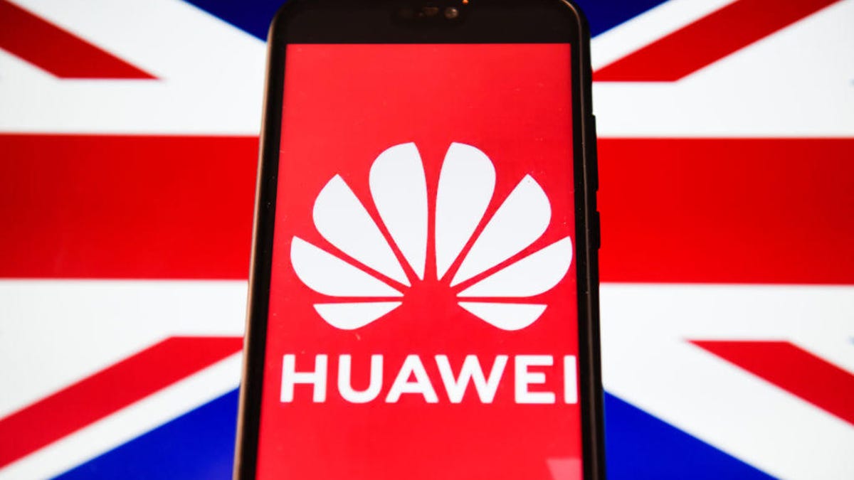 In this photo illustration a Huawei logo seen displayed on a