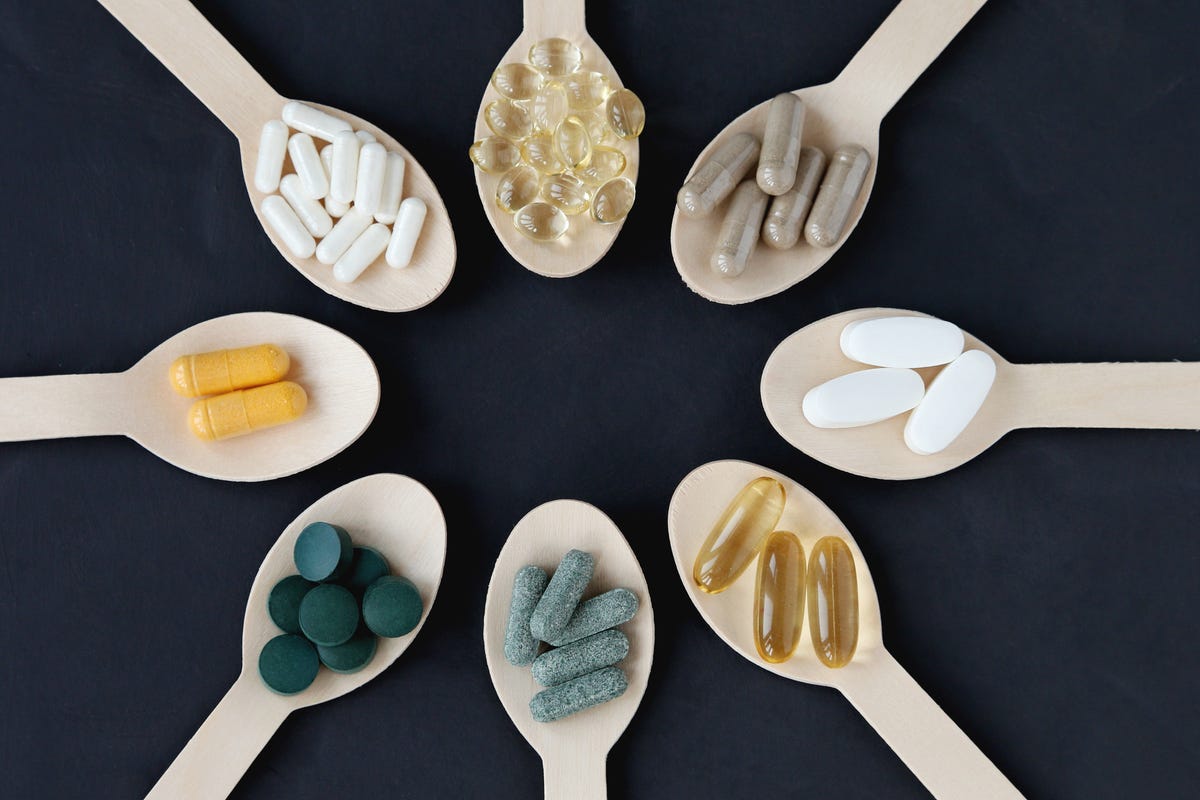 Collection of Nutritional Supplements on spoons in a circle
