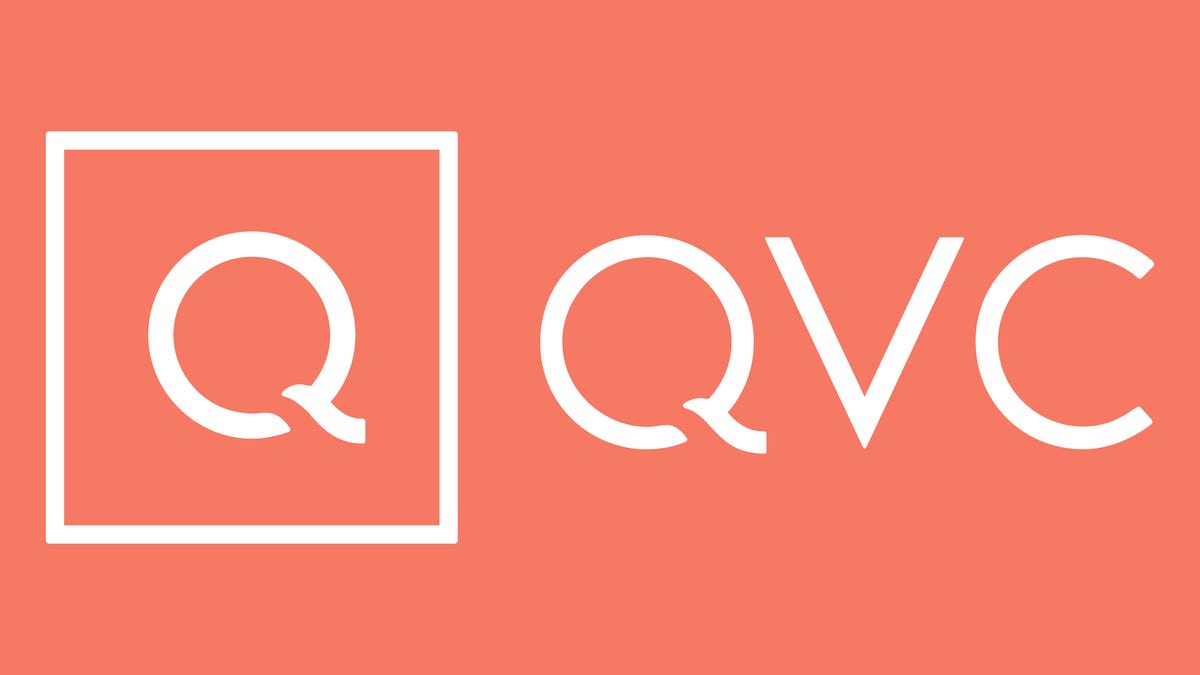 The QVC logo against a light orange background.