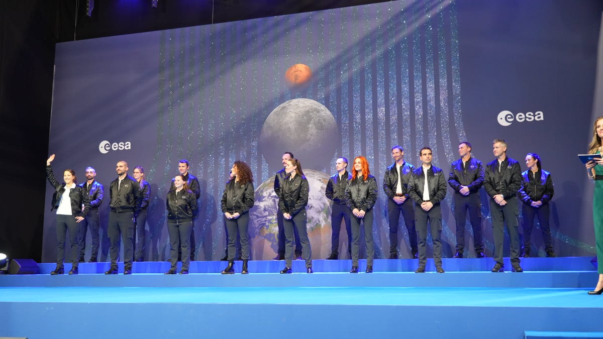 ESA's 17 new astronaut candidates stand on stage