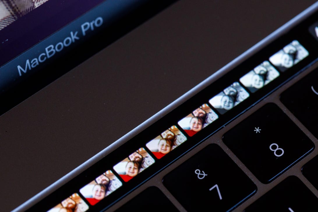 Apple's Photos app uses the Touch Bar to preview several filter effects.