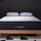 Helix Midnight Luxe mattress on a bed frame
