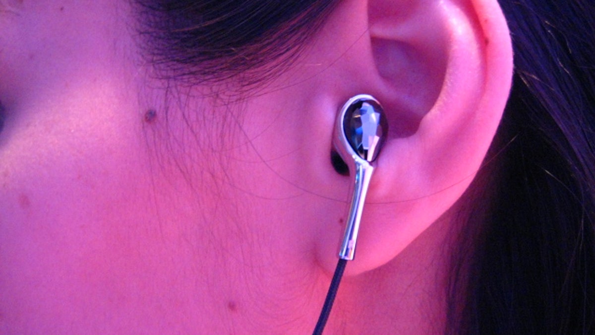 Photo of Philips SwarovskyiActive Crystal earbuds.