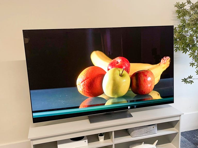 The 2023 LG G3 OLED TV sitting on a light gray TV console.
