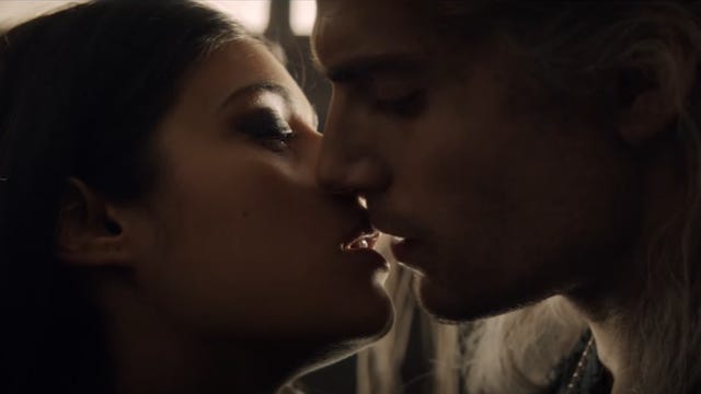 Yennefer and Geralt share a kiss in The Witcher.