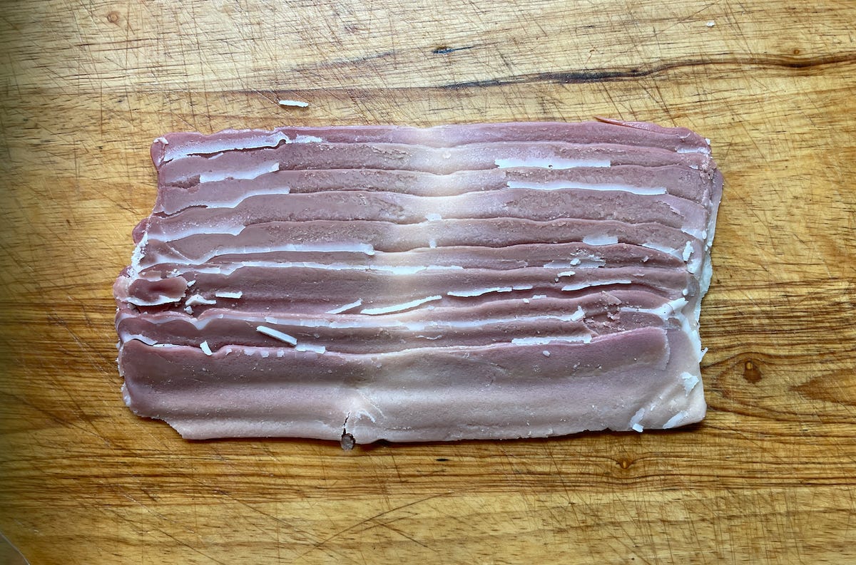 uncooked vegan bacon on cutting board