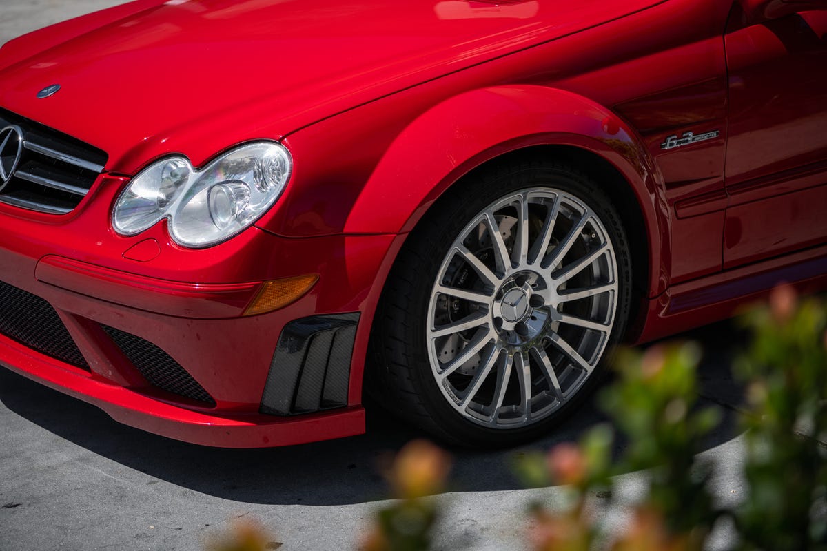 Front left headlamp and tire of a Mercedes-Benz CLK63 AMG Black Series