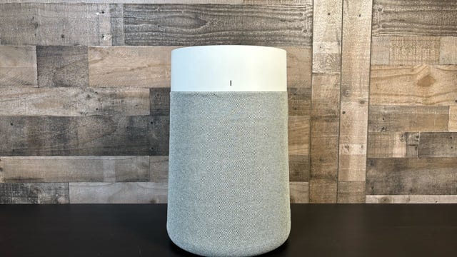 The BlueAir Blue Pure 311i Max air purifier sits on a table in front of a wooden wall. It's CNET's top-rated air purifier for medium-sized spaces, and our top overall pick for most shoppers.