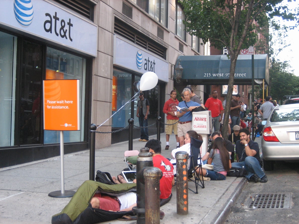 In front of the AT&T store on 95th Street and Broadway, one guy camped out in his sleeping bag.