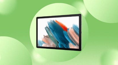 A Samsung A8 tablet against a green background.