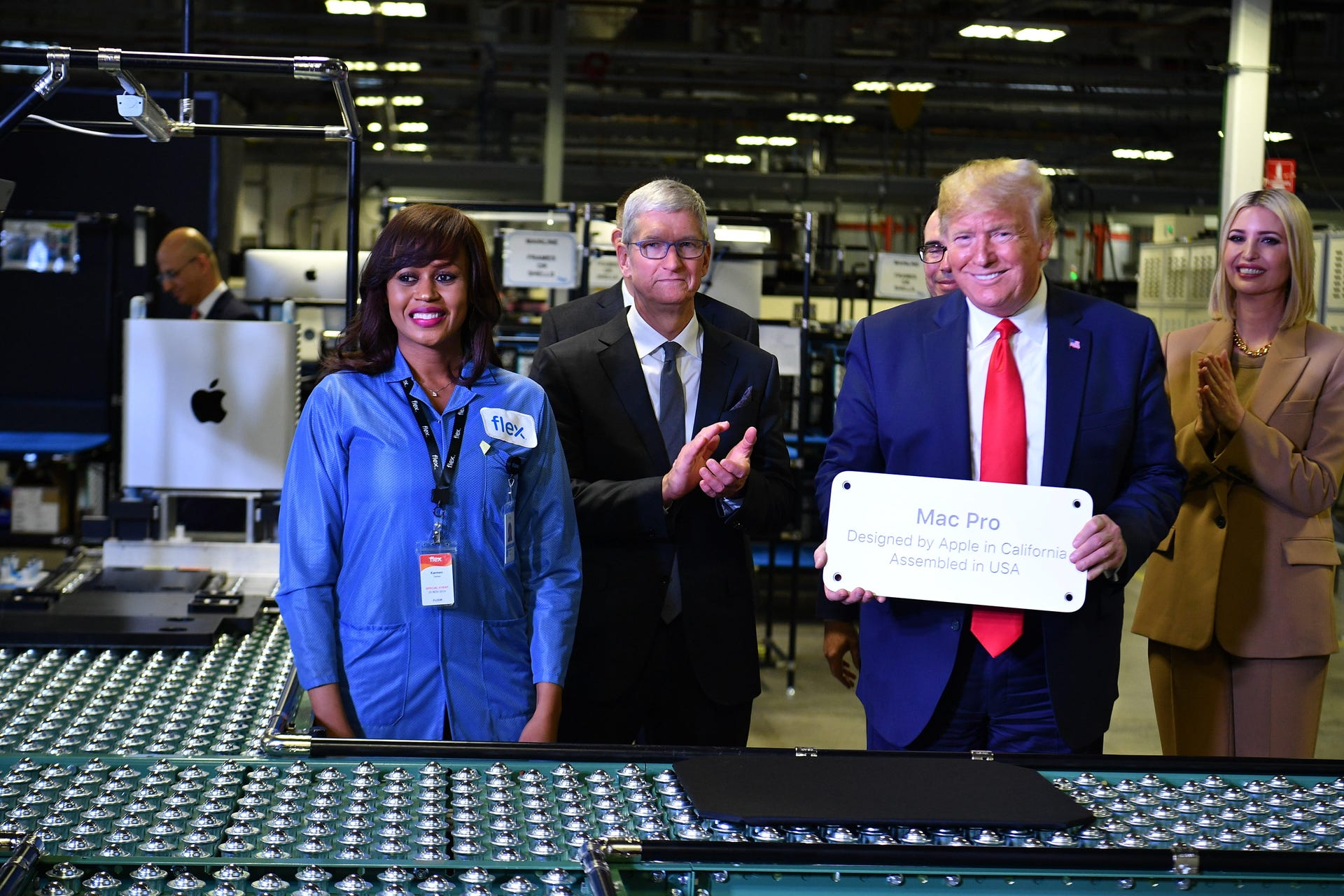 Tim Cook and Donald Trump at Apple's Texas manufacturing plant in 2019