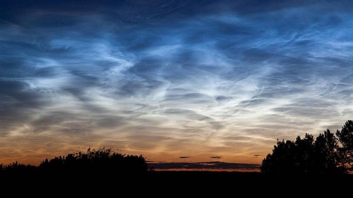 Noctilucent clouds in the evening sky