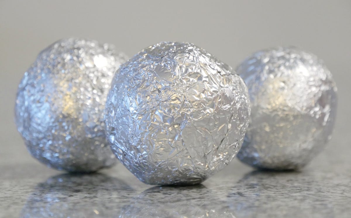 Three balls of aluminum foil