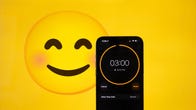smiley face and a phone with a timer set for 3 minutes