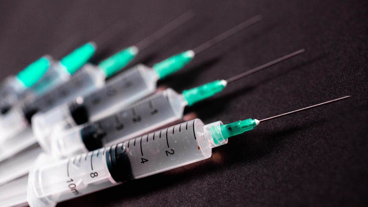 covid-19-vaccines-regular-endless-booster-shots-syringes-winter-2021-cnet-106