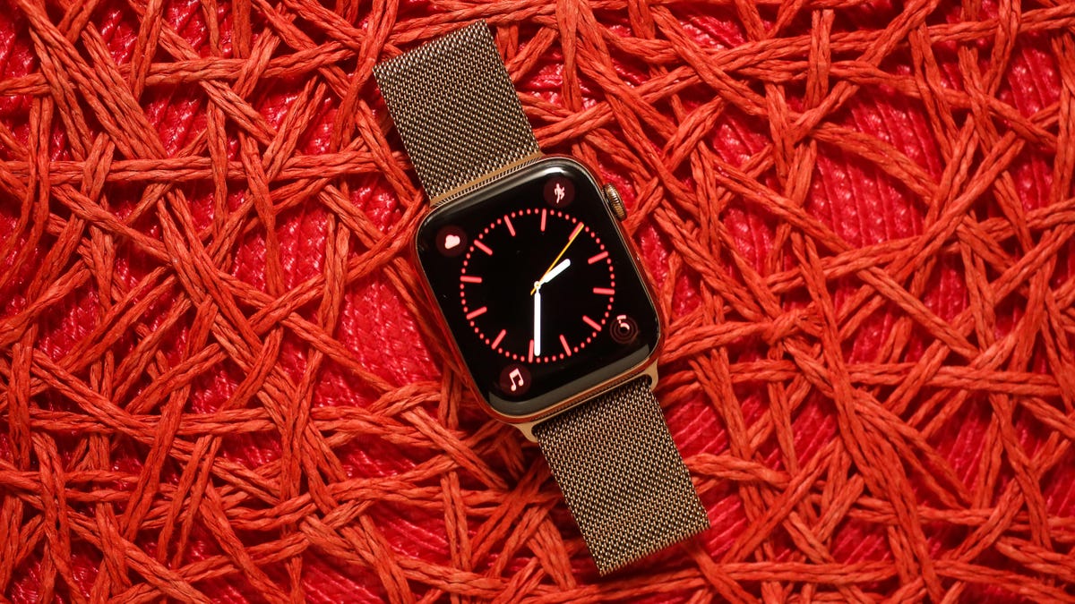 The Apple Watch Series 4 against a pink background