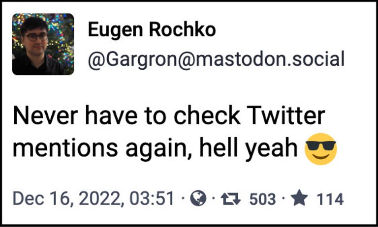 A screenshot of a Mastodon post from creator Eugen Rochko: Never have to check Twitter mentions again, hell yeah. Rochko's line is followed by an emoji wearing dark sunglasses.