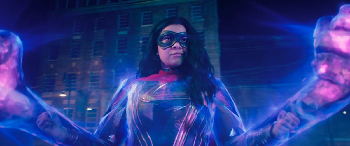 Kamala Khan clad in purple light armor with giant fists in Ms.  Marvel