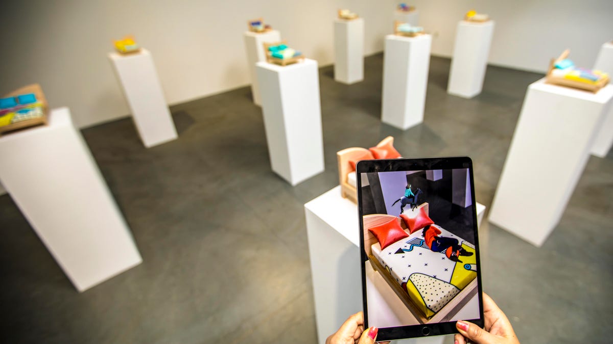 Festival of Impossible augmented reality exhibition: "Miniature bed sculptures act as platforms for artist Gabriel Barcia-Colombo's friends, who have been translated to avatars. The AR animations tell the story of each personality as we observe their dreams."
