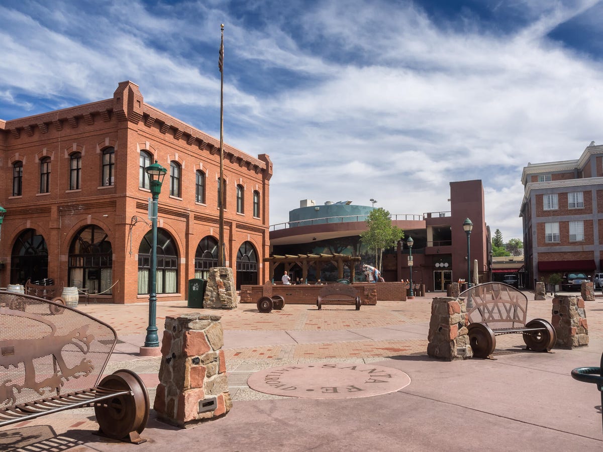 Flagstaff, Arizona, main square with a pueblo house in the foreground.