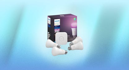 A Philips hue five-piece starter kit against a blue background.